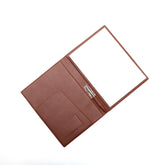 Portablocco formato A4 in pelle martellata arancione. Prodotto a mano da Pianigiani bags